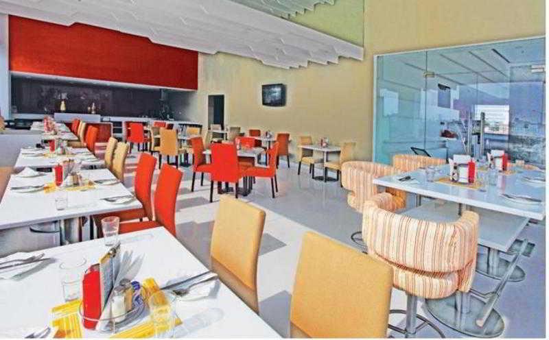 คีย์ ซีเล็ค บาย เลมอนทรี โฮเทล ลูเธียนา Hotel ลูดิฮานา ร้านอาหาร รูปภาพ
